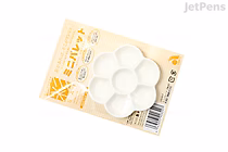 A white plastic watercolor palette with seven wells arranged in a flower shape, displayed on its original yellow and white packaging labeled "Akashiya Sai Watercolor Mini Palette for Waterbrush Pen."