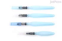 Four Pentel Vistage water brushes in different sizes, arranged horizontally from largest to smallest, each with a translucent light blue handle and a clear water reservoir.