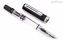 A TWSBI ECO Black fountain pen with a fine nib, shown uncapped. The pen has a transparent barrel revealing the ink reservoir and internal mechanism, with black accents on the cap, grip, and piston knob. The cap is placed beside the pen.