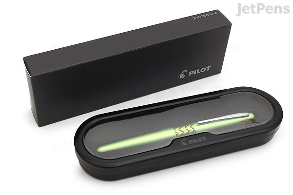 A Pilot Metropolitan Retro Pop Fountain Pen in green marble finish with a fine nib, displayed inside a black protective case next to a matching black box.