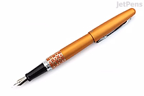 Orange Pilot Metropolitan Retro Pop fountain pen with a fine nib, featuring a floral pattern near the grip section.