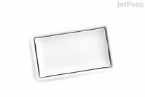 A rectangular white watercolor paint pan labeled "Kuretake Gansai Tambi Watercolor - White (No. 10)" with a slightly textured surface.