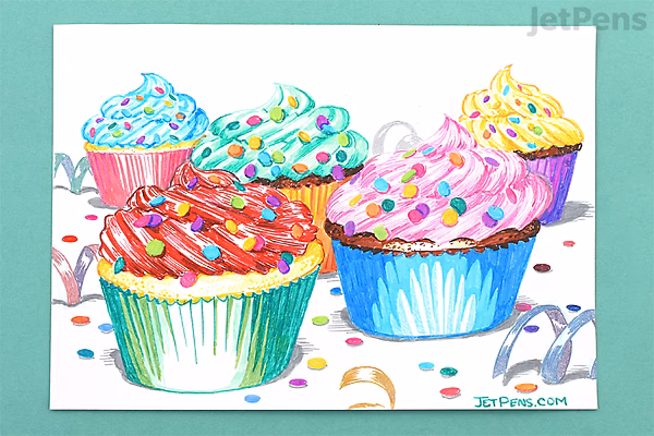 A colorful drawing of five cupcakes with swirled frosting and sprinkles, created using vibrant shades of blue, pink, yellow, green, and red. The illustration showcases the smooth, detailed lines typical of a fine 0.5 mm gel pen.
