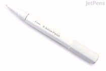 White Pilot Juice Paint Marker with a fine point tip, shown uncapped on a white background.