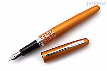 Orange Pilot Metropolitan Retro Pop fountain pen with a medium italic nib, featuring a floral pattern on the grip section and a matching orange cap placed beside it.