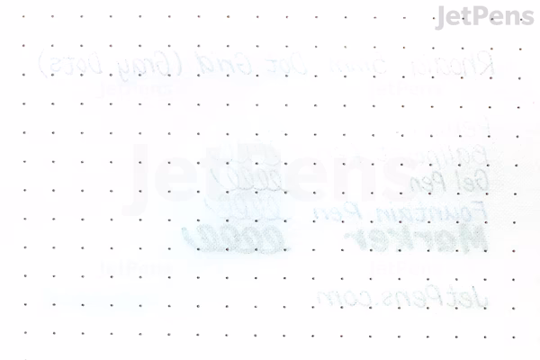 A close-up view of a Rhodia DotPad notepad page featuring a light gray dot grid pattern on white paper. The dots are evenly spaced, forming a subtle guide for writing or drawing. The page is blank with no visible writing or markings.