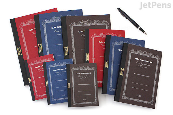 A collection of Apica Premium C.D. Notebooks in various sizes and colors, featuring B5 size and 7 mm ruled lines, arranged with a black pen on a white background. Covers have a classic, elegant design with text and border details.