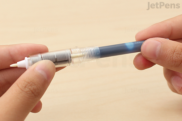 Press firmly until the cartridge punctures.