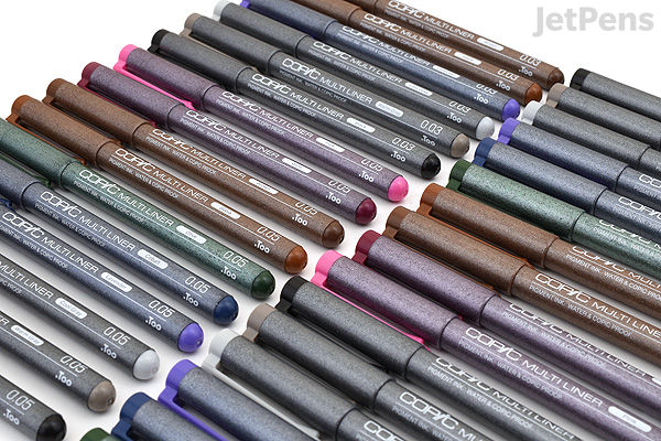 A close-up image of multiple Copic Multiliner pens arranged in rows, showing various colors with black bodies and colored caps, labeled with 0.05 mm tip size.