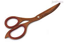 A pair of Nakabayashi Hikigiri Slim Scissors with a pink-brown titanium-coated finish, featuring slim, pointed blades and ergonomic handles.