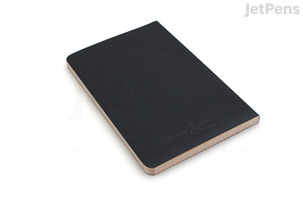 A Stillman & Birn Nova Sketchbook with a soft black cover, measuring 5.5 by 8.5 inches, shown closed on a white background.
