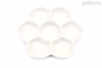 White porcelain paint palette shaped like a flower with seven wells arranged around a central well.