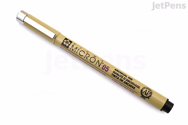 A Sakura Pigma Micron pen, size 05 with a 0.45 mm black tip, shown horizontally on a white background. The pen has a beige body with black text and a black cap end.