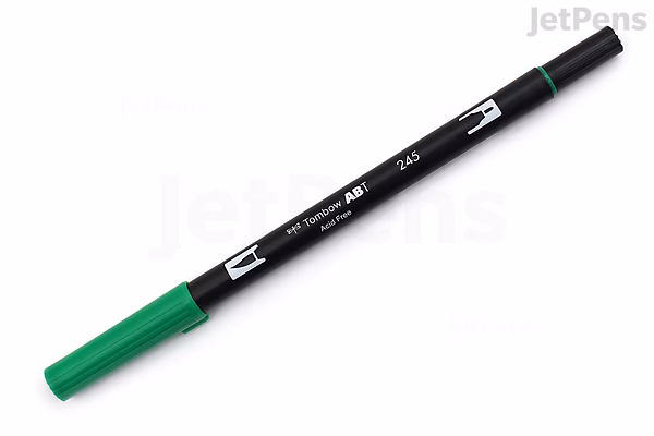 A Tombow Dual Brush Pen with a black body and green cap on one end, labeled with the color name "Peach (020)."