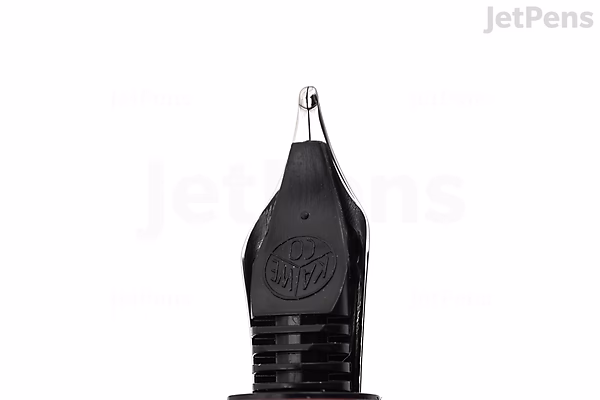 Close-up image of the nib of a Kaweco AL Sport fountain pen in deep red color, featuring a broad tip and a black grip section.