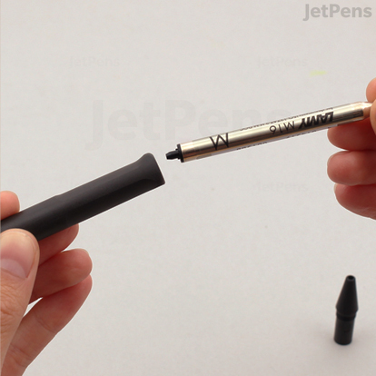Place the refill inside the barrel of the pen.