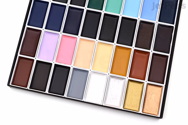 Kuretake Gansai Tambi watercolor palette with 48 vibrant colors arranged in a rectangular tray, featuring a mix of dark, bright, and pastel shades for diverse artistic use.