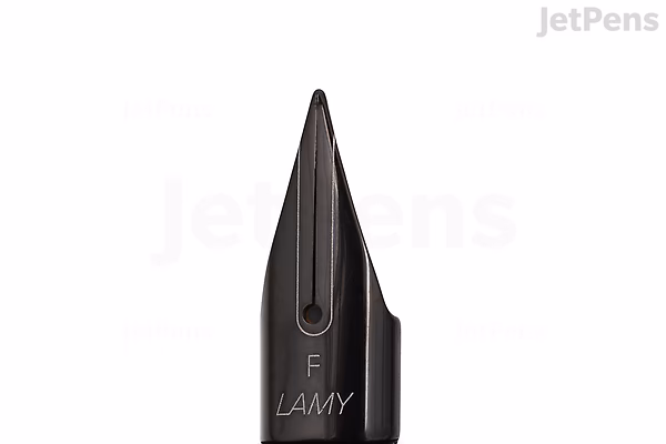 Close-up image of a LAMY Lx Marron fountain pen nib, showing the fine tip and engraved branding details.