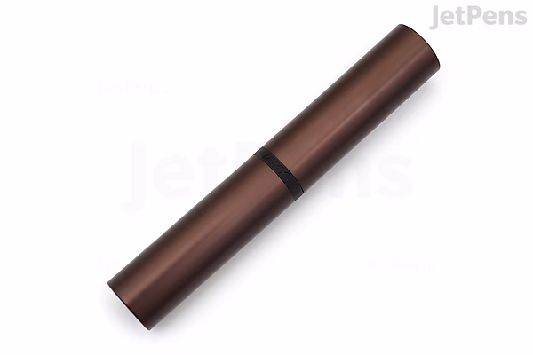 A closed LAMY Lx fountain pen in a matte marron (brown) color with a sleek, cylindrical design and a black band near the cap. The pen has an extra fine nib.