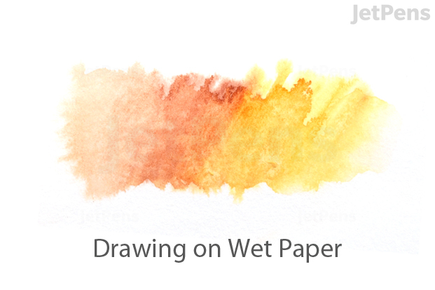 A blended swatch of Faber-Castell PITT Pen ink made on wet paper. The ink has spread out slightly and has an organic, soft-focus look.