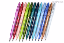 A set of 12 Pentel Fude Touch Brush Sign Pens arranged in a row, showcasing a variety of vibrant colors including shades of pink, red, green, blue, brown, and gray.