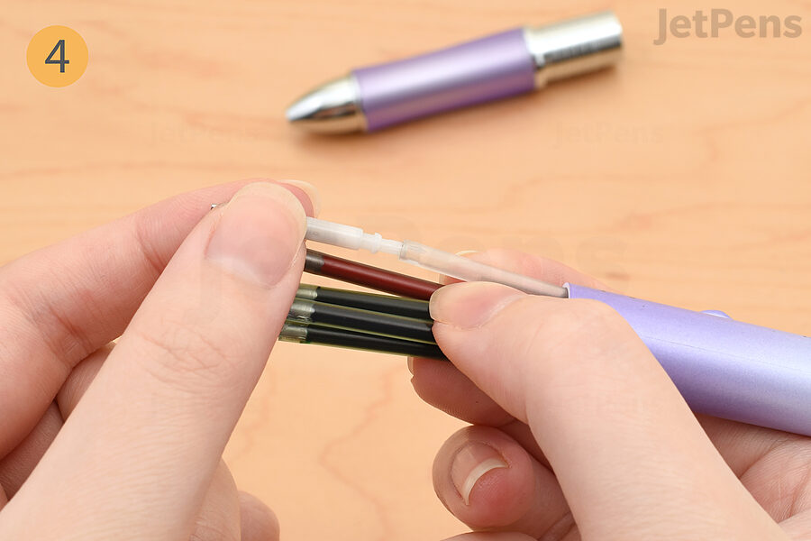 Put the tip back onto the pencil component.