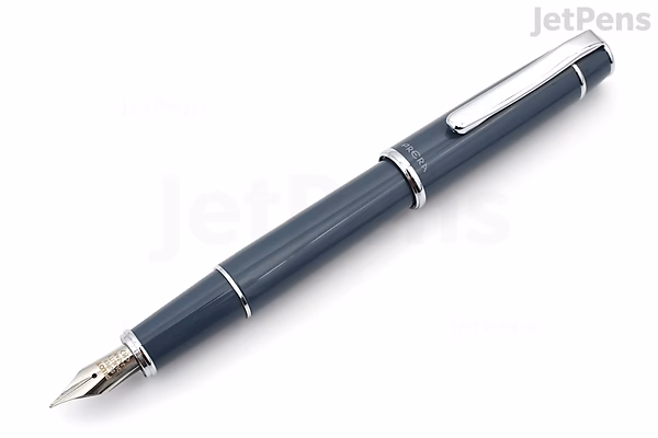Slate gray Pilot Prera fountain pen with a medium nib, featuring a silver clip and trim, shown uncapped and angled diagonally on a white background.