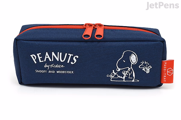 Navy blue rectangular pencil case featuring white illustrations of Snoopy and Woodstock from Peanuts, with red zipper pulls and a red side tag. The text "PEANUTS by schroeder" is printed in white on the front.