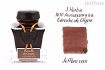 A 50 ml glass bottle of J. Herbin Caroube de Chypre ink with a dark brown wax seal and orange ribbon. Next to the bottle is a swatch of the ink color, a rich reddish-brown shade. The text reads "J. Herbin 1670 Anniversary Ink Caroube de Chypre."