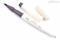 Image of a Sailor Shikiori Double-Sided Brush Pen in Chushu (Mid-Fall Gray) color. The pen is white with gold accents, featuring a brush tip on one end and a fine tip on the other, with the cap removed from the brush tip end.