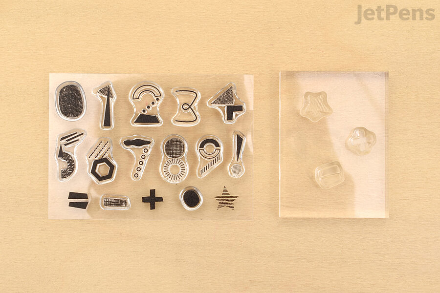 Nombre Mizushima Jizai Clear Stamps on table
