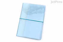 A translucent light blue plastic sticker album with a world map design on the cover, secured with a blue elastic band. The album is labeled as a Jam Studio Sticker Album for long sticker sheets.