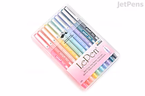 A set of 10 Marvy Le Pen fine point marker pens in pastel colors, arranged in a clear plastic case with a pink label. The pens display a range of soft shades including pink, peach, yellow, green, blue, and purple.