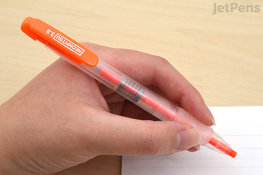 The Kutsuwa Neonpitsu Knock Highlighter Pencil isn't as bright as a traditional liquid highlighter, but it will never smear.