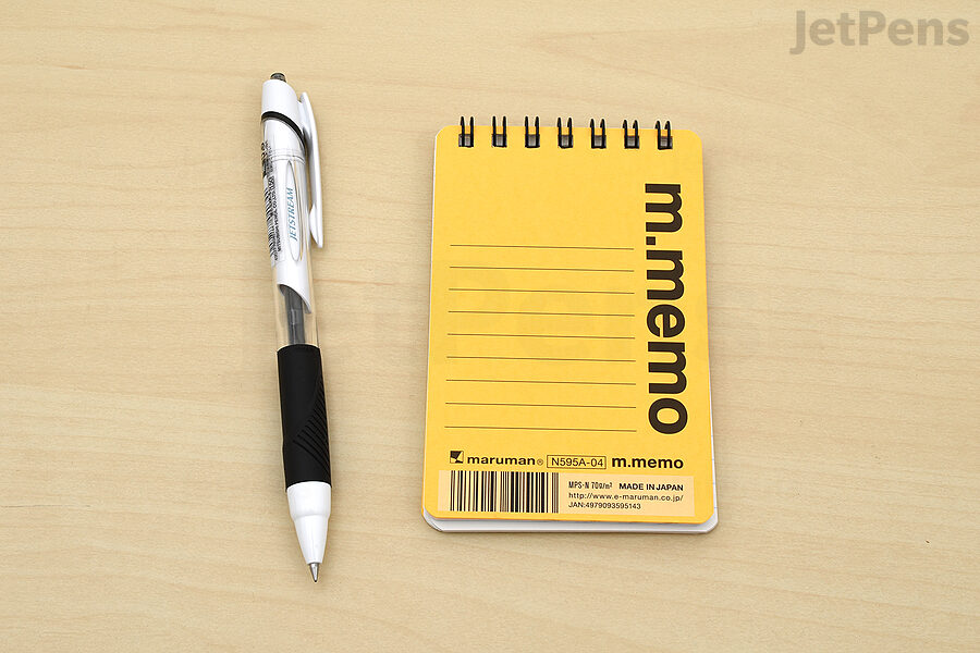 Maruman M.Memo Mini Notepads are bound with rings at the top, which won't get in the way while you write.