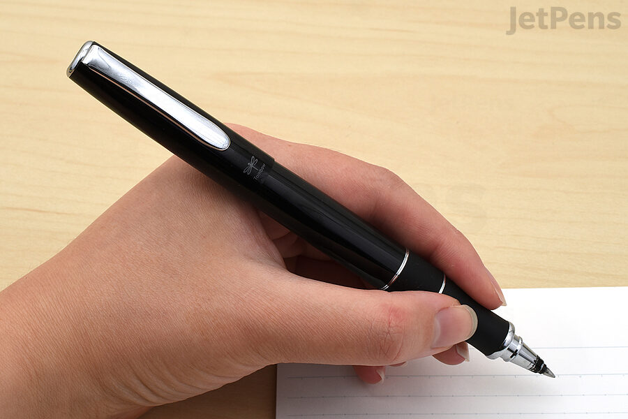 The Tombow Zoom 505 Rollerball Pen uses an ink that takes time to dry, but we love the pen body's ergonomics.