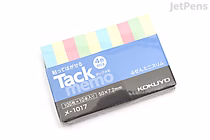 A pack of KOKUYO Tack Memo N Sticky Notes in Mini Slim size (5.0 cm x 0.7 cm) featuring four pastel colors: yellow, pink, green, and blue. The notes are arranged in a row inside a clear plastic case with a blue and white label.
