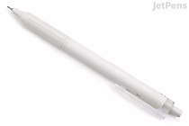 Image of a Tombow MONO Graph Lite ballpoint pen with a 0.5 mm tip. The pen has black ink and a smoky white body with a clear clip and a retractable tip.