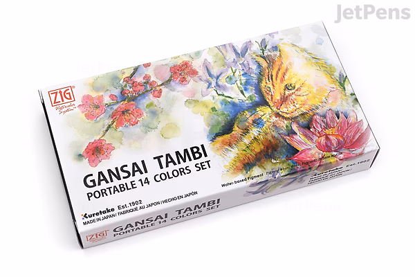 A rectangular box of Kuretake Gansai Tambi Mini Watercolor Palette featuring 14 colors. The packaging displays vibrant floral artwork in various shades of red, purple, yellow, and green. The brand name and product details are printed on the front.