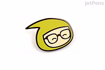 Enamel pin featuring a stylized yellow face with glasses and closed eyes, smiling gently.