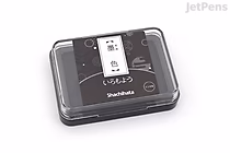 Black Shachihata stamp pad with Japanese traditional Iromoyo design, rectangular shape with rounded edges, and a label featuring Japanese characters.