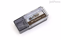 A black-bodied Tombow MONO Pocket Correction Tape dispenser with a transparent section showing the white correction tape inside. The label on the dispenser indicates it is 5 mm wide and 4 meters long.
