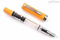 A TWSBI ECO-T Saffron Limited Edition fountain pen with a fine nib, featuring a transparent barrel and bright orange cap and end.