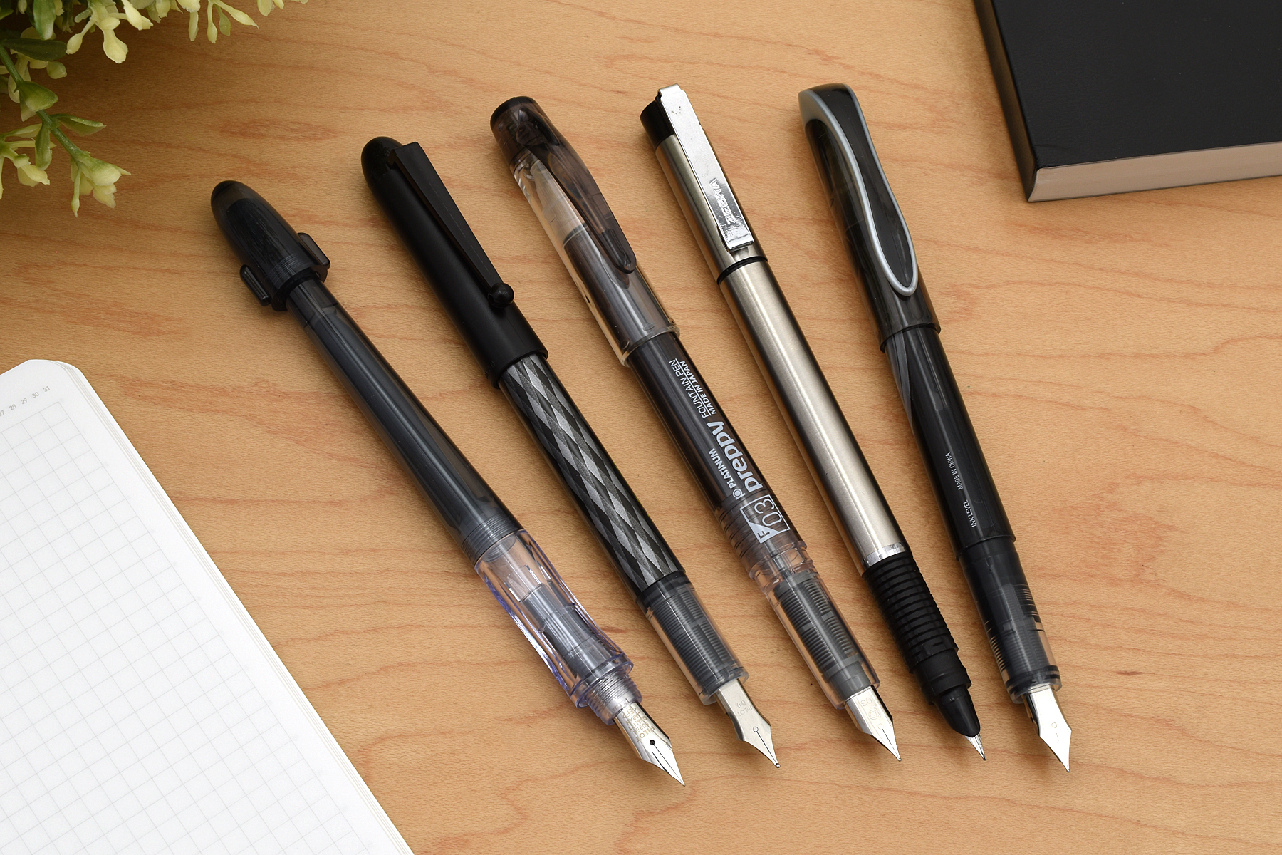 Consider a beginner fountain pen to learn about its different parts and how each component works.