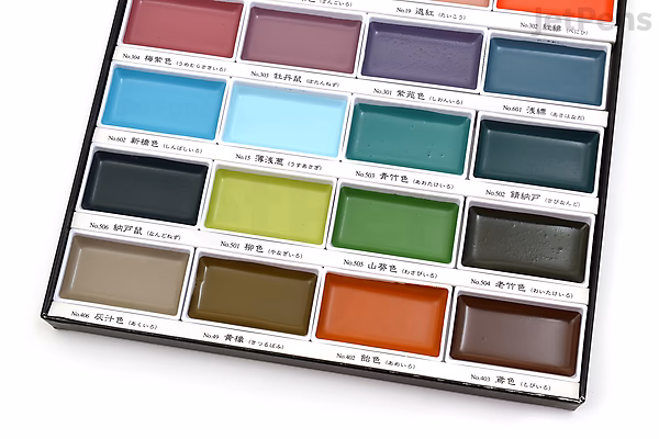 A Kuretake Gansai Tambi watercolor palette featuring 24 vibrant rectangular paint pans arranged in four rows, showcasing a range of colors including reds, blues, greens, yellows, browns, and blacks.
