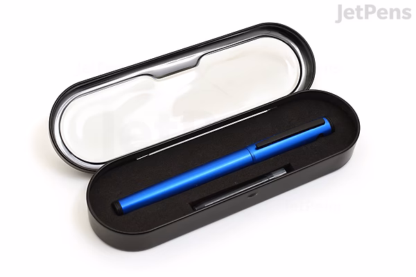 A sleek gray Pilot Explorer fountain pen with a fine nib, displayed inside an open black and white protective case.