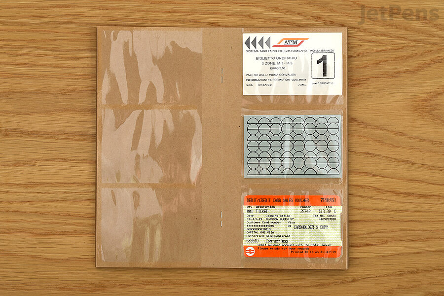 The Regular TRAVELER’S notebook Kraft Card File can hold up to sixty cards.