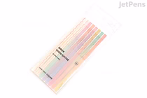 Pack of long, narrow Iconic Index Highlighter Sticky Notes in pastel garden colors, arranged in a gradient on a clear backing sheet with product branding visible.