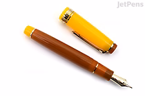A Sailor Pro Gear fountain pen with its cap removed and placed beside it. The pen body is a warm brown color, while the cap is bright yellow with gold accents. The nib is silver with intricate detailing. The image is set against a plain white background.