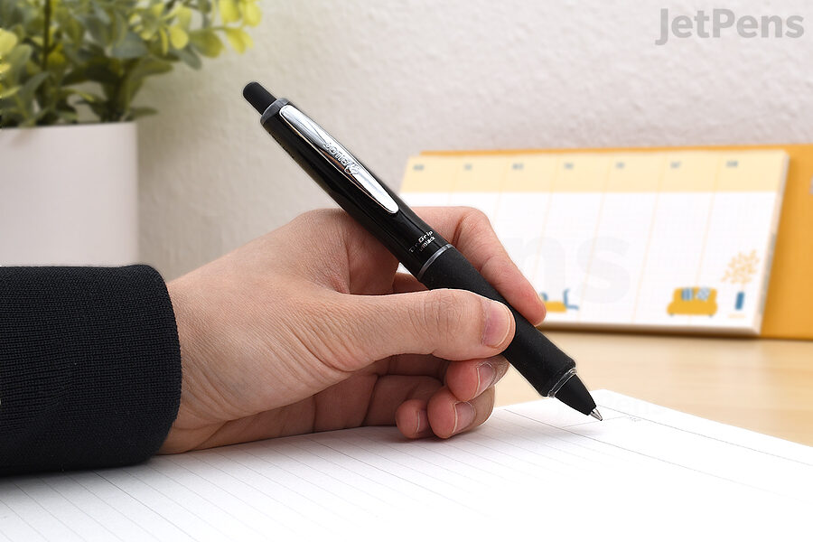 Gripping the pen about 1” to 1.5” away from the tip can be helpful for left-handed writers.